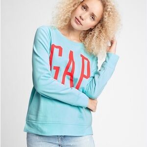 Women’s GAP Light Teal Crewneck with Pink Lettering, size Medium